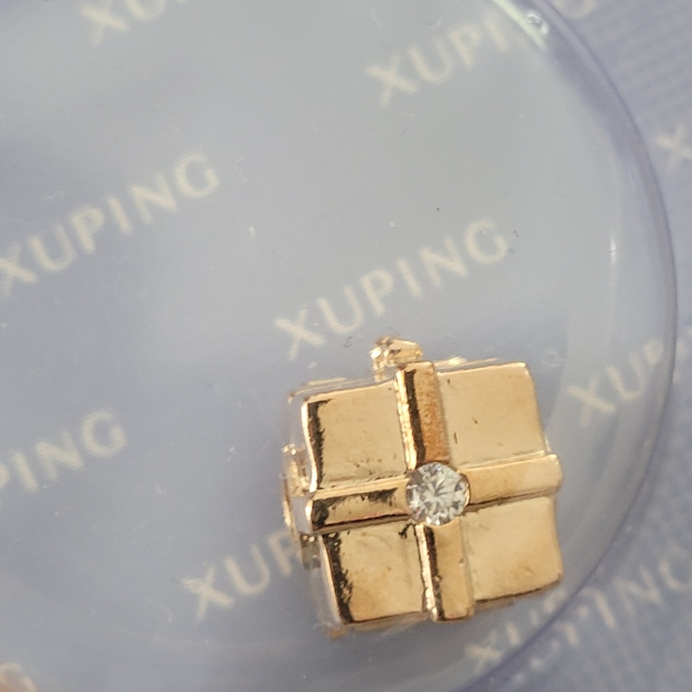 Gold charm